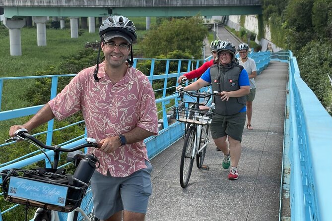 4 Hour Afternoon Cycling City Tour North with Snack - Dadaocheng Pier Plaza and the open river path