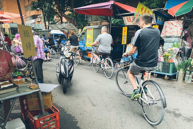 4-Hour Morning Cycling City Tour (incl. breakfast) - Dadaocheng Pier and the Tamsui River view