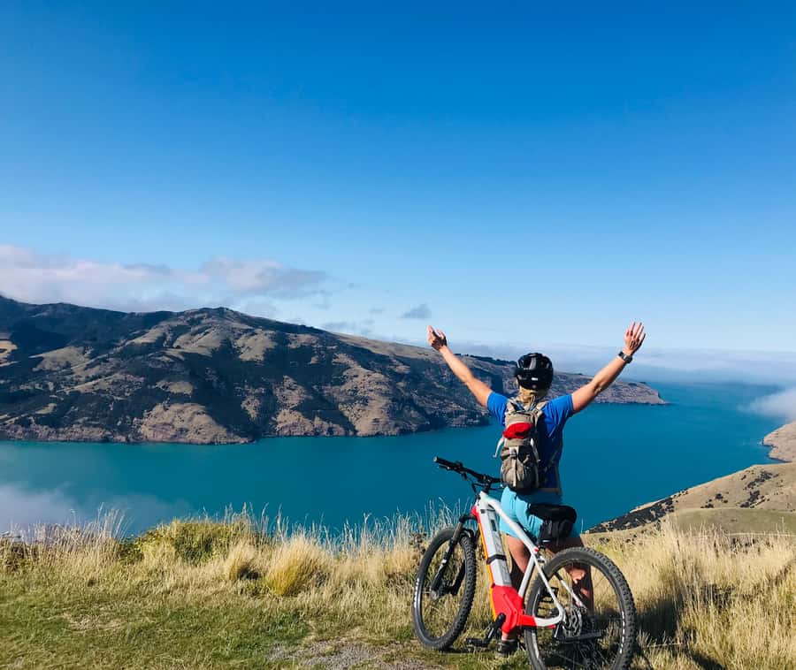 Akaroa: Guided Electric Mountain Bike Tour-Lava Loop - Climbing toward the crater rim