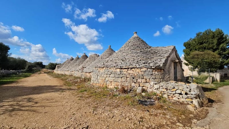 Alberobello: Easy UNESCO Trulli E-Bike Ride to Locorotondo - Quiet roads through olive groves and stone walls