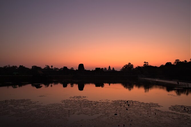 Angkor Sunrise Expedition Cycling Through Serene Backroads - Ta Prohm by local roads and wooded paths