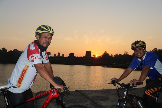Angkor Sunrise Expedition Cycling Through Serene Backroads - Bayon and the faces of the central temple