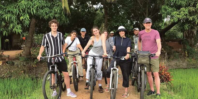 Anuradhapura: Private Half-Day Cycling Tour w/ Guide - Ruwanwelisaya, pilgrims, and rows of elephants