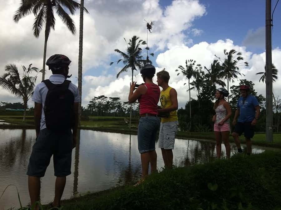 Bali Downhill Cultural Cycling Tour - Coffee with a priest and his family