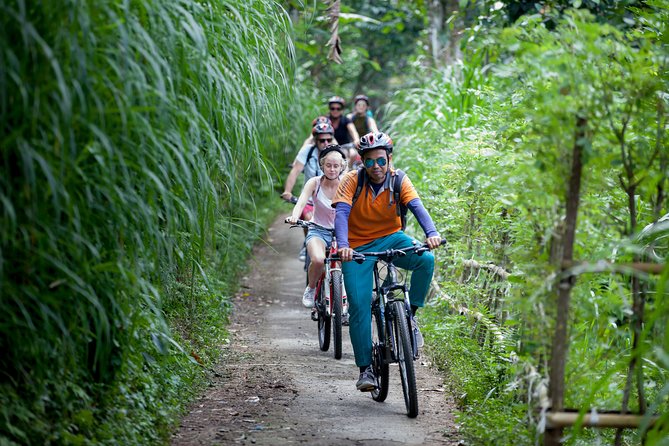 Bali Rocky cycling tour - Rice fields, narrow paths, and village life
