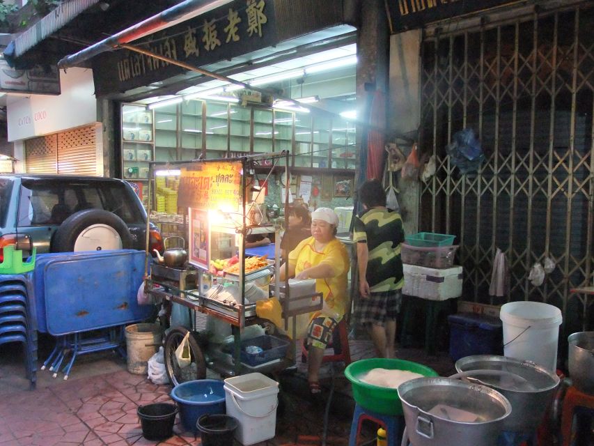 Bangkok by Night Cycling Tour with Street-food Meal - Riverside views of the Memorial Bridge and Grand Palace