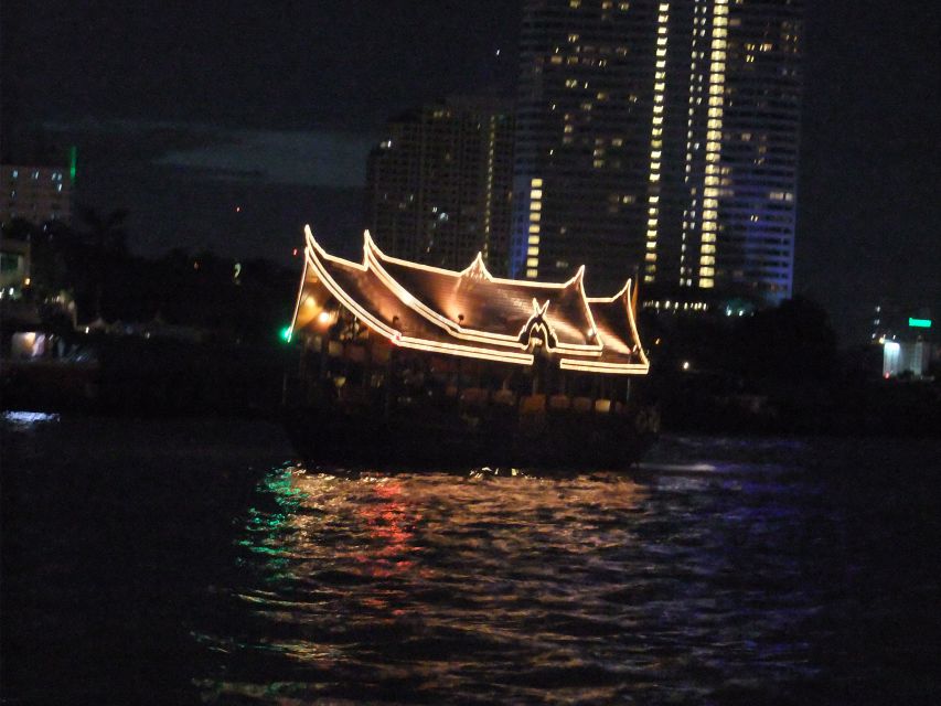 Bangkok by Night Cycling Tour with Street-food Meal - Crossing the Chao Phraya by pedestrian ferry