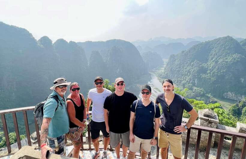 Best Ninh Binh Day Tour: Tam Coc - Hoa Lu - Lunch & Cycling - Seeing Tam Coc from a local sampan