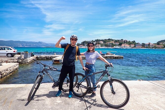 Bike & Wine Korčula Adventure - Half Day Guided Bike Tour - Leaving Korčula Old Town by Bike