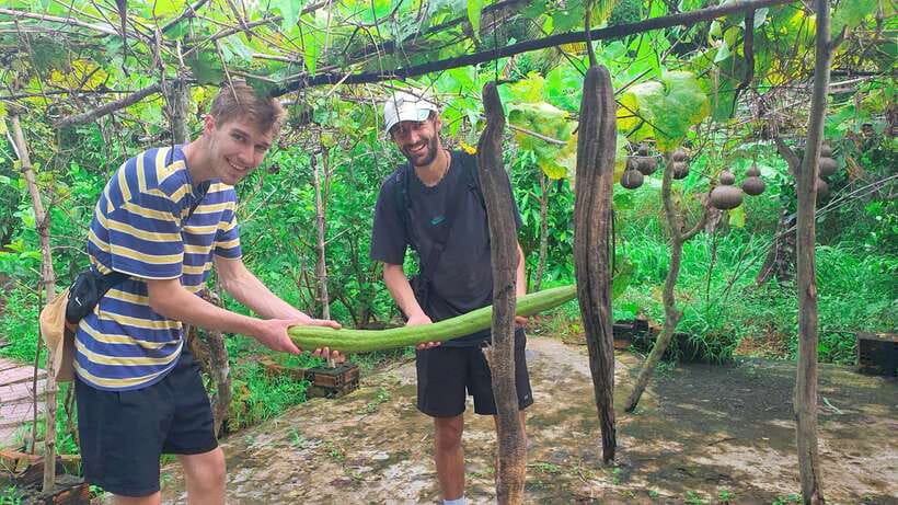 Can Tho: Countryside Cycling Tour with Cocoa Farm Visit - Crossing the river by ferry