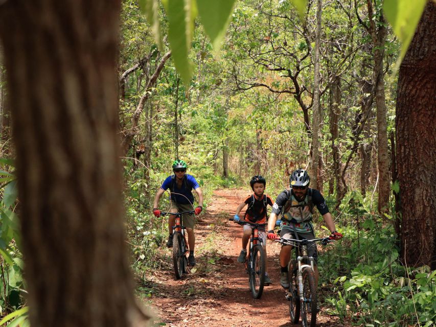 Chiang Mai: Boat Ride and Cycling Tour to Sticky Waterfall - Guides, photos, and how the day feels