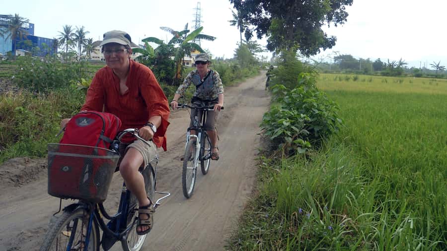 Countryside Bike Ride to Golong Village and Lingsar Temple - Rice paddies, village food, and everyday Lombok