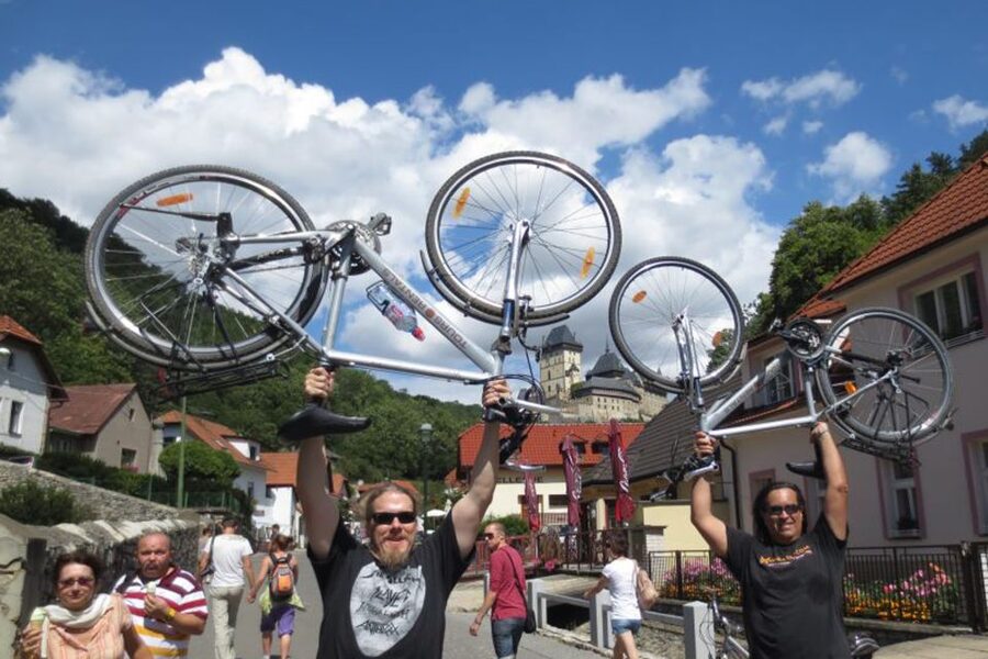 Countryside Bike Tour From Prague To Karlstejn Castle - The uphill walk to Karlstejn Castle