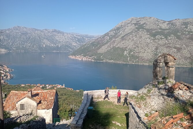 Cycling and hiking short tour through the bay of Kotor - Cooling off from a dock in Kotor Bay
