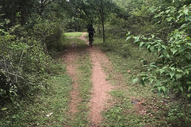 Cycling in rural Kanchanaburi area - Pedaling through fields, villages, and jungle