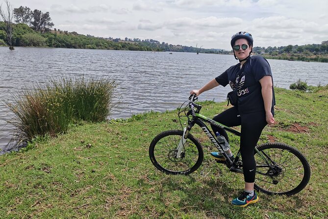 Cycling The Cradle of Humankind in Game Reserve - A guide who adjusts the day