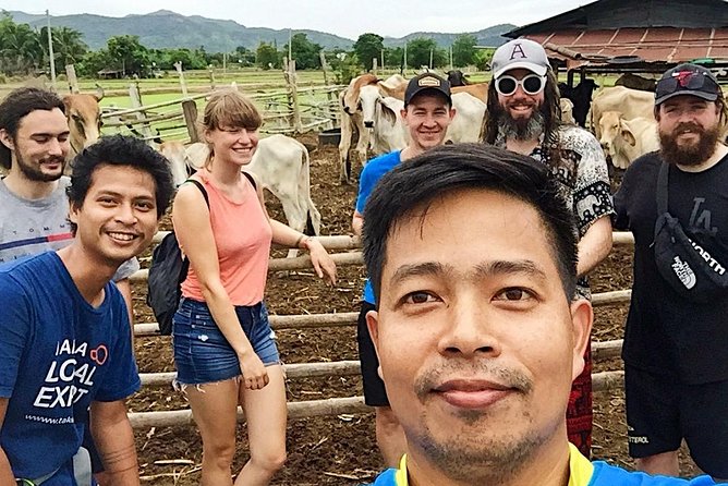 Cycling to visit Local Experience and Learn Culture with Local expert - Taking your bicycle across the River Kwai by boat