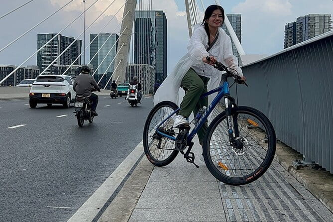 Discover Ho Chi Minh City’s Street Food & Hidden Life by Bicycle - Four districts, small alleys, and everyday city life