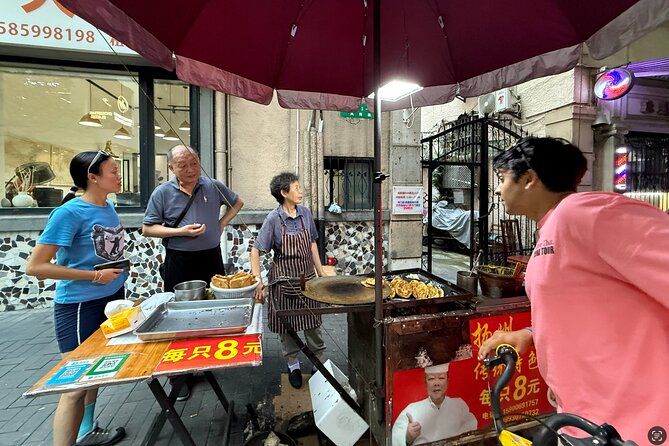 Discover Local Life and Street Food Shanghai Bike Adventure - Key points at a glance