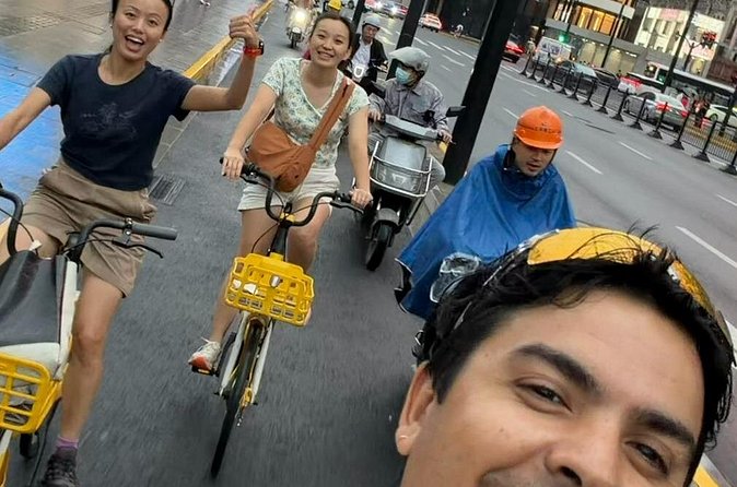 Discover Local Life and Street Food Shanghai Bike Adventure - Stories of conflict, growth, and everyday workers