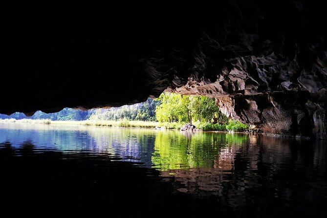 Discover Trang An Natural World Heritage, Bich Dong Pagoda, Cycling Day Tour - Bich Dong Pagoda beneath the cliffs