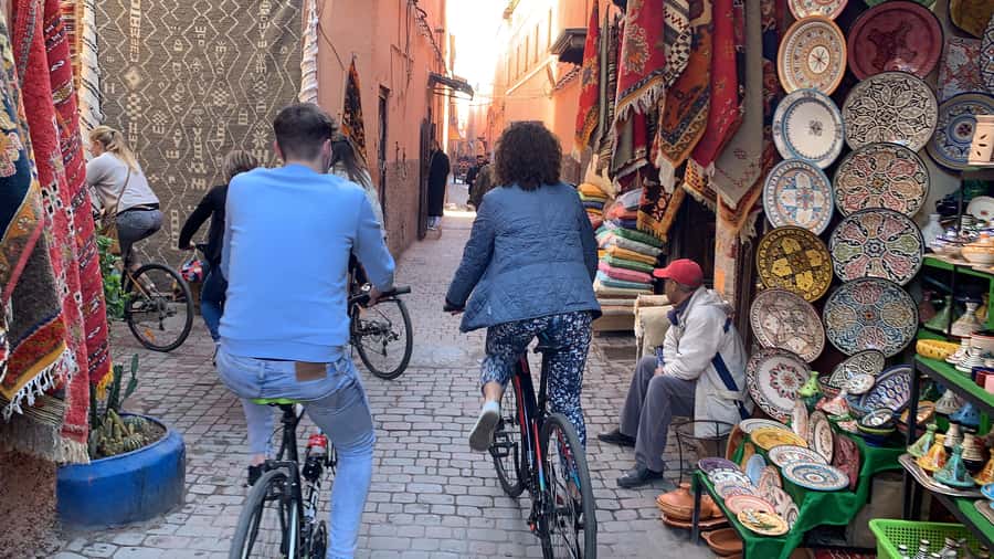 Dutch Bike Tour in Marrakech with Local Guide - Crossing from modern streets into the medina