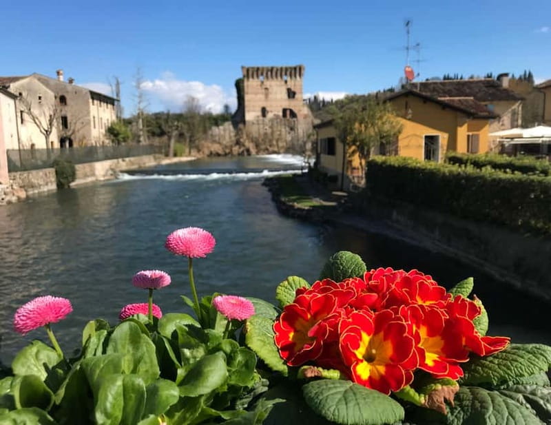 E-bike adventure among villages and medieval castles - Riding through farms, fruit trees, and vineyards