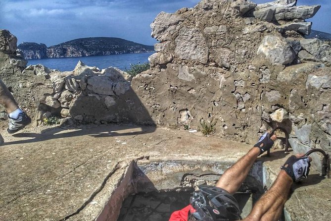 E-bike Excursion at Natural Park of Porto Conte - Punta Giglio - E-MTB Adventure - Mugoni beach, reached by single-track trail