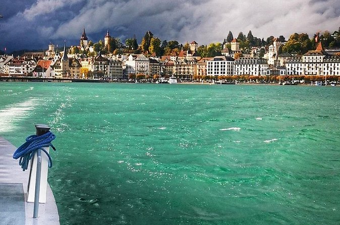Explore Lucerne’s Hidden Gems Sunset City Cycling Tour - Cycling through Lucerne’s old streets and waterfront