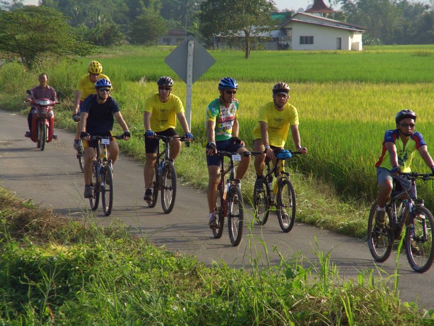 From Chiang Mai: Mae Taeng Valley and Waterfalls Cycle Tour - Buatong Sticky Waterfalls after the ride
