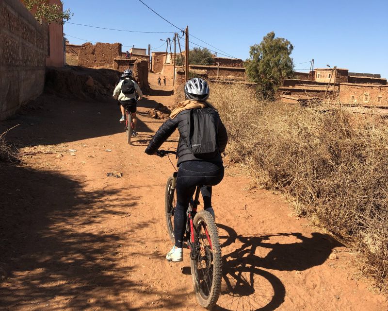 From Marrakech: Atlas Mountain and Berber Village Bike Trip - Passing Berber villages and farm terraces