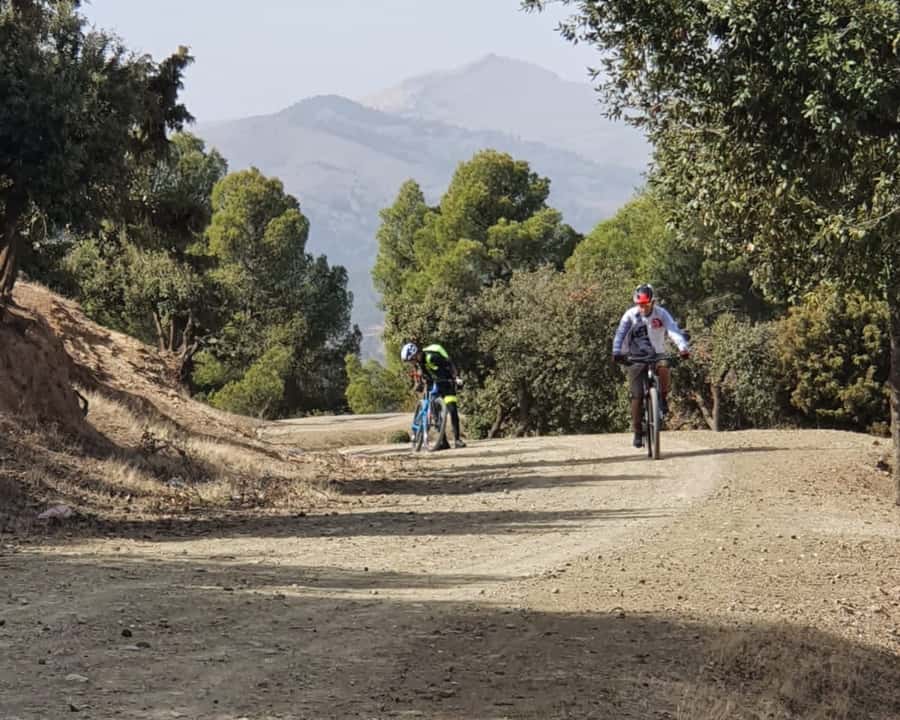 From Marrakech: Atlas Mountain and Berber Village Bike Trip - Lalla Takerkoust Dam and the lake