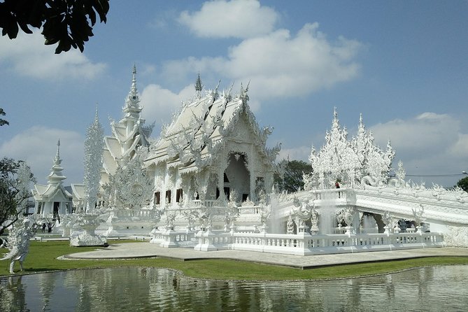 Full Day Cycling Amazing Chiangrai countryside and the White temple - Seeing the White Temple from the road