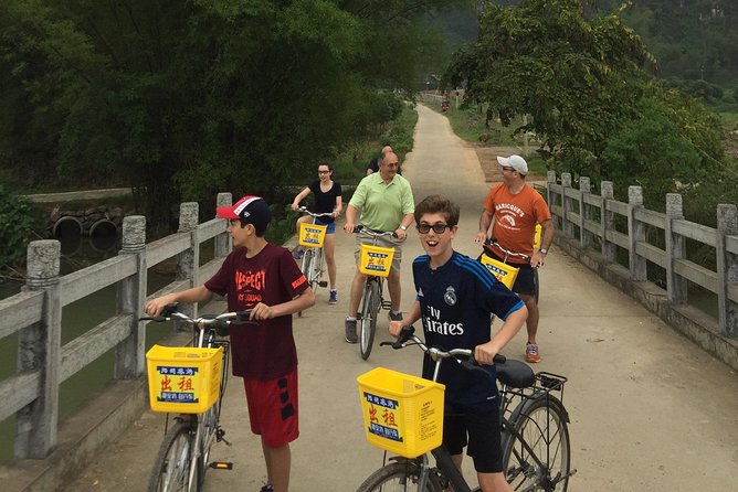 Full-day Tour: Cycling, Rafting & SanjieLiu Outdoor Water Theatre - Moon Hill and the view through the arch