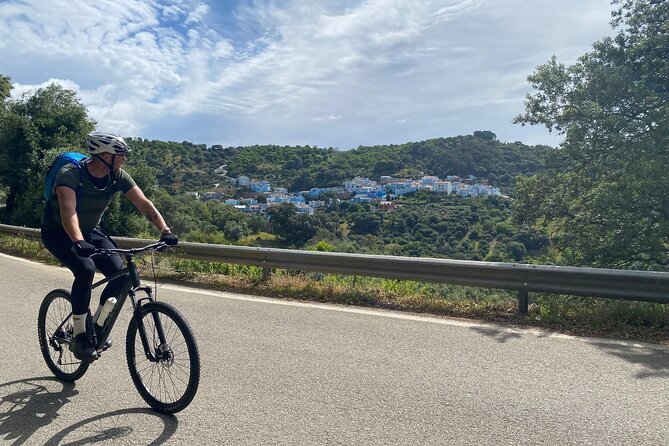 Guided Cycling - Blue Village Ronda - Moderate Level Difficulty - Through the chestnut forest to Juzcar