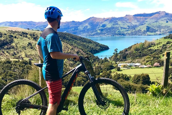 Guided Electric Mountain Bike Tour- Akaroa Explorer - Riding through Akaroa’s historic village