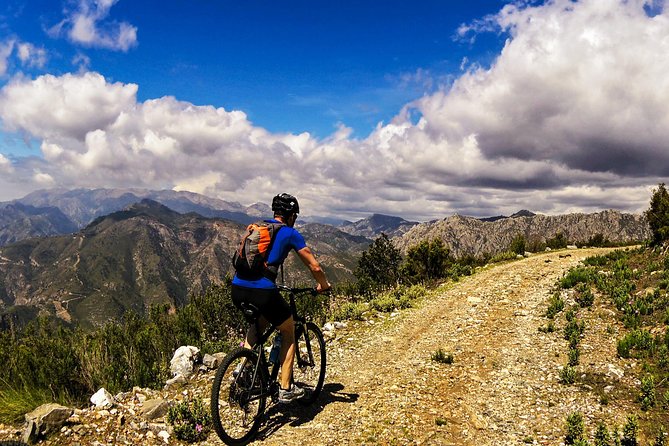 Guided Mountain Bike Adventure - Fruit valleys, mountain scenery, and the sea