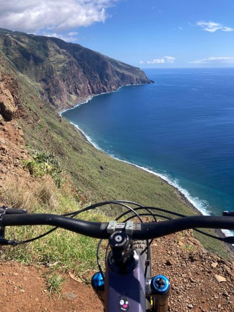 Half-Day Cross-Country Mountain Biking in Madeira - Descending through forest and open views