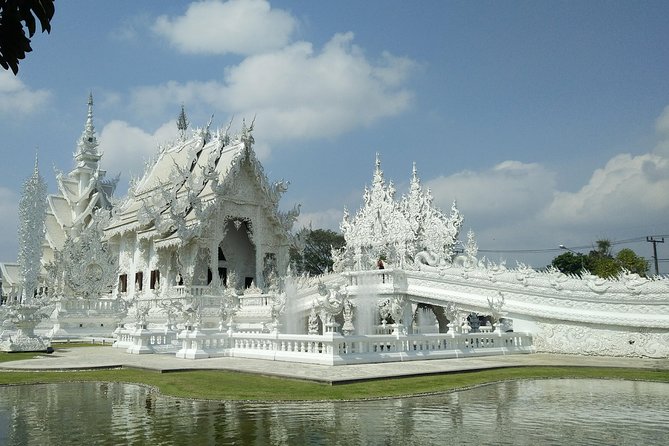 Half Day Cycling Tour to the White temple - Arriving at Wat Rong Khun