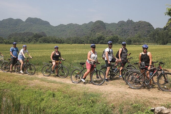 Hoa Lu - Tam Coc - Mua Cave 1 Day with Cycling, Hiking, Lunch - Guide quality and the feel of the day