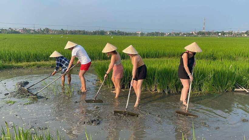 Hoi An: Buffalo riding, Cycling,be a Farmer and Fisher man - Cooking banh xeo in a local home