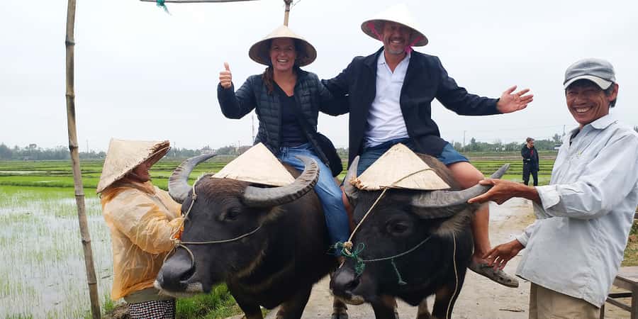 Hoi An: Countryside by Cycling, Buffalo Riding & Do Farming - Getting your hands muddy on a rice farm
