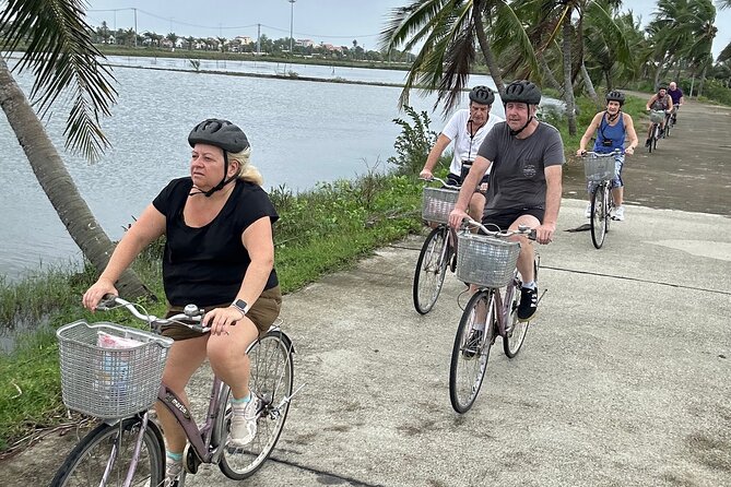 Hoi An countryside cycling Tour,Basket Boat-organic farming-lunch - Reaching Bay Mau Coconut Forest by bike
