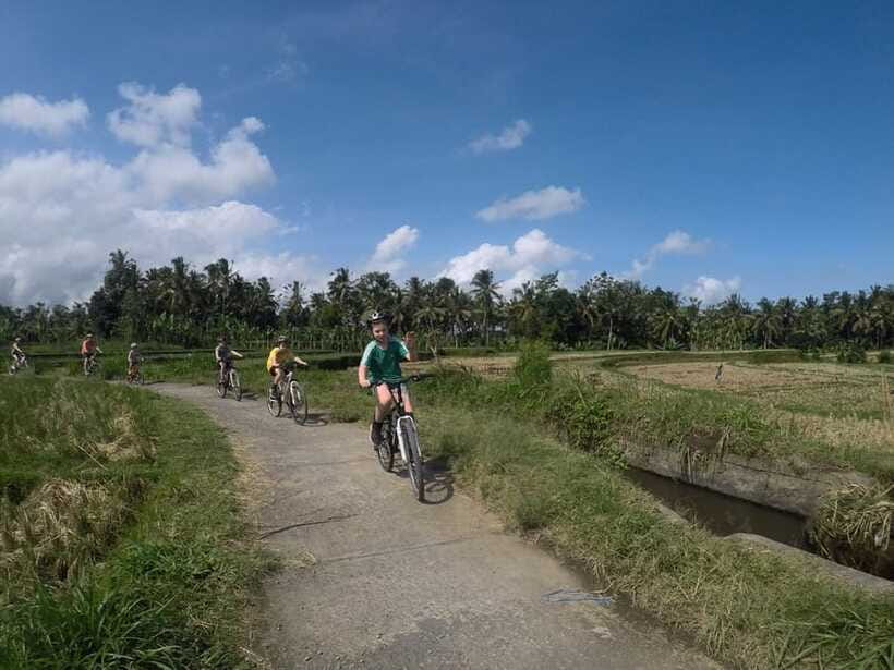 Kuta: Kintamani Culture and Nature Guided Cycling Tour - The guides and group size