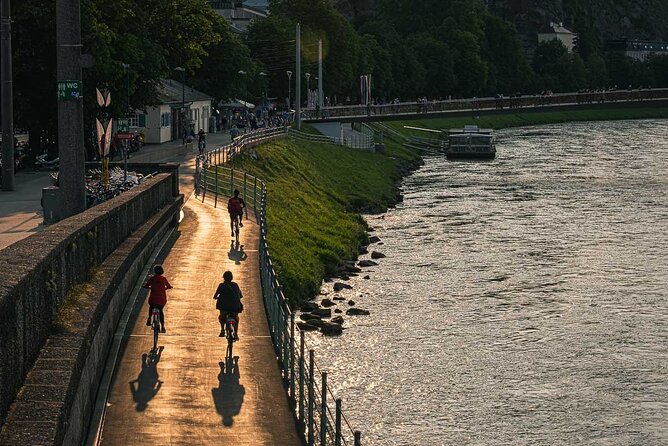 Lonely Goatherd Bike Tour: Cycle Salzburg's Surroundings with the Sound of Music - Starting near the river and leaving the old town behind