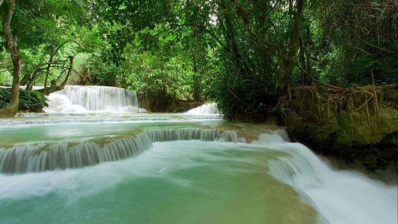 Luang Prabang: Kuang Si Bike Ride & Long-Tail Boat Cruise - Thirty kilometers of paved road and village views
