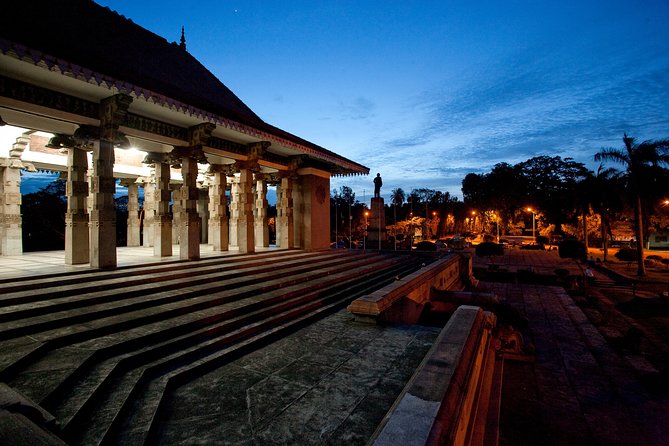 Luxury Night Cycle Tour of Colombo - The old hotel, clock tower, and a very small prison cell
