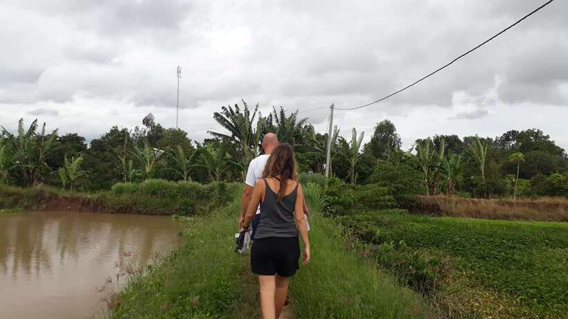 Mekong Day Tour by Car:Cai Be market, Local Island & Cycling - A home-cooked lunch in a garden house