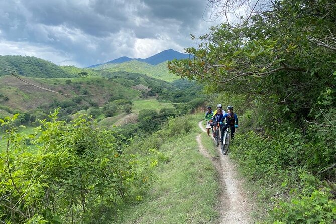 Mountain Bike Tour through Guatemala - Villages, rivers, bridges, and open mountain views