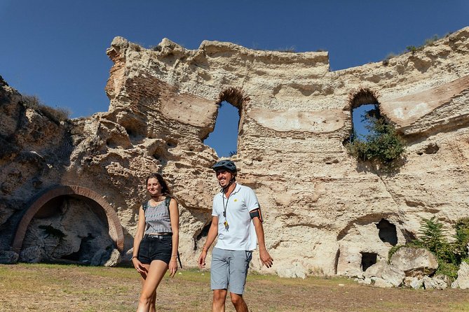 Naples Scenic E-Bike Ride to a Local Vineyard with Meal - The waterfront and the Macellum of Pozzuoli